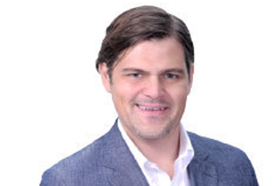 Headshot of JC Dringenburg